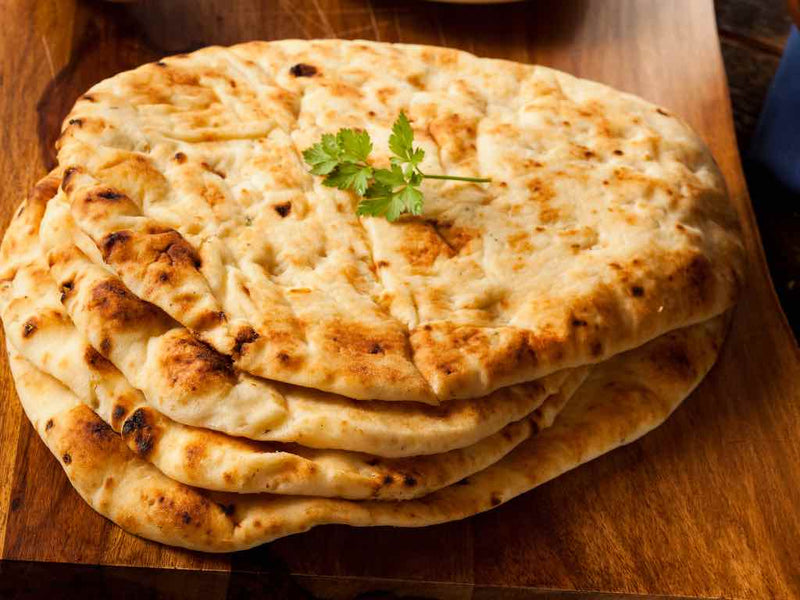 Kulcha vs Naan Unraveling the Culinary Tale of Two Indian Breads One