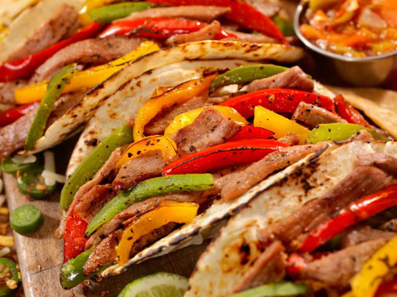 Exploring the Flavorful Showdown: Fajita vs Taco – One Stop Halal